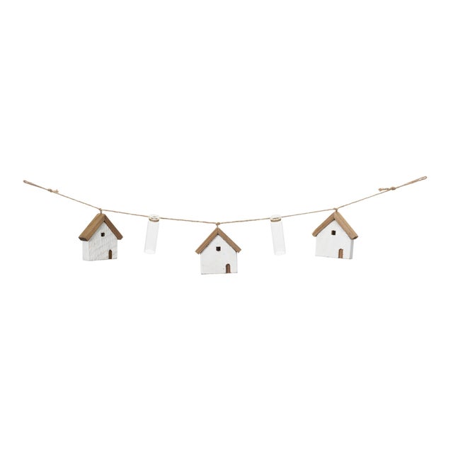 Transform your home into a festive wonderland with the House and Tube Vase String Garland Set. This charming garland...