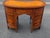 This exceptional Continental kidney-form desk exhibits master craftmanship, featuring exquisite satinwood marquetry inlay...