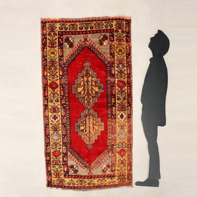 Anatolian rug in cotton and wool, large knot, hand-made. This piece is attributed to the mentioned designer/maker. It has...