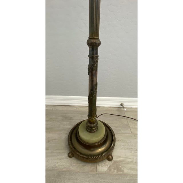 M.S.L.C. Antique floor lamp with green onyx in base. 2 separate switches; one controls center 3 way bulb and the other...