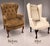 A classic Queen Anne Style Wingback Chair featuring from the original antique condition tufted upholstery, rolled arms...