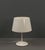 This table lamp from the 2000s, designed by c halskov & dalsgaard for ikea, impresses with its clean, modern lines and...