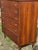 Vintage mid-century Bassett Trimline model walnut highboy dresser with silver pulls. This mid century dresser features...