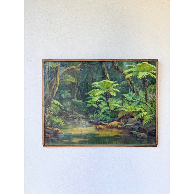 Antique oil painting depicting a jungle or fern-like forest landscape. we love its vibrant green tones and vivid, verdant...