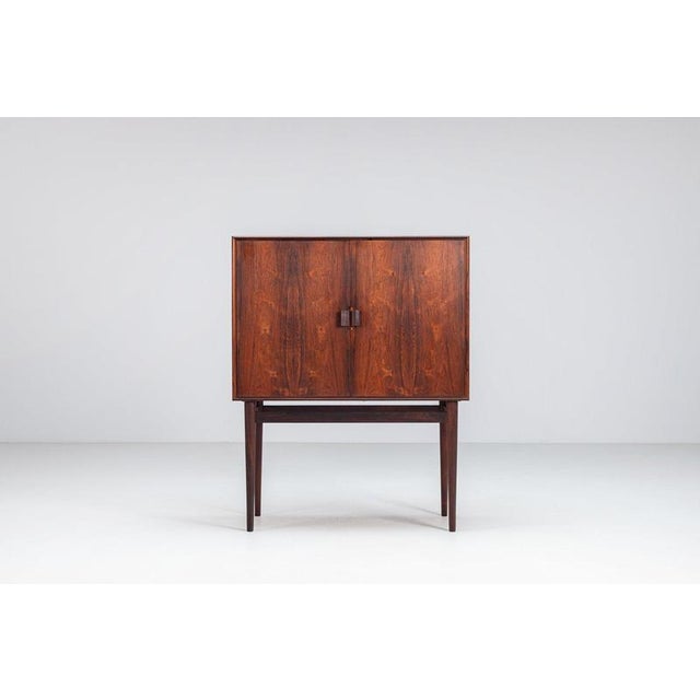 A beautiful and refined bar cabinet designed by renowned Danish designer Helge Vestergaard Jensen and manufactured by...