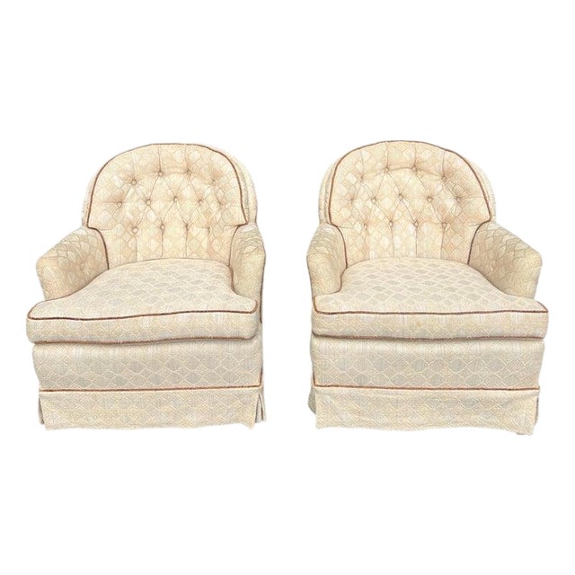 Pair of Tufted Button Back Swivel Chairs in a Cream Color With Brown Piping For Sale
