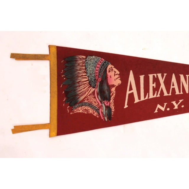 Large vintage felt souvenir pennant from Alexandria Bay, NY with original chief graphics. Actual pennant measures 27"w,...