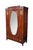 This elegant Edwardian Neoclassical knockdown armoire is masterfully crafted from rich mahogany wood and adorned with...