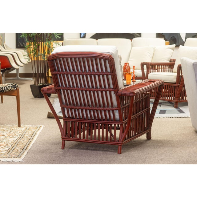 A vintage set of Palecek "President's Chair" patio chairs. This chair is a beautiful and unique version of the...