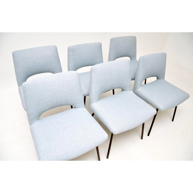 A stylish and very well made set of six vintage mid century dining chairs. They were made in England, they date from the...