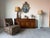 Elegant 1970s French Provincial sideboard cabinet by Henredon featuring beautifully carved walnut construction with rich...