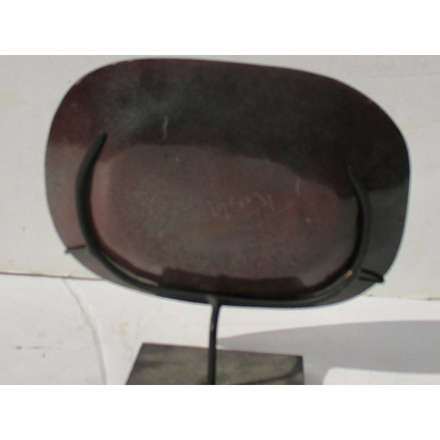 MCM enamel tray. An abstract glyph in the center and shading across the bowl in a modern shorthand for a graphic style....