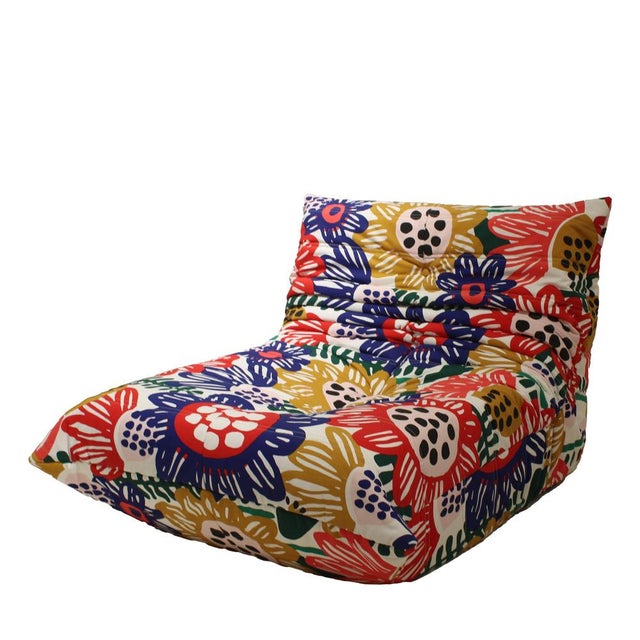 This exceptional lounge chair and ottoman set, crafted in France in 1978, features organic, sculptural forms designed to...