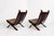 A pair of original Focus sling-type lounge chairs, manufactured by Bramin Møbler in the 1970s. The chairs contain cognac-...