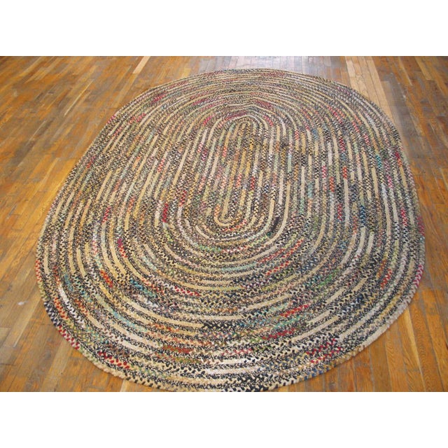 Vintage American Braided Rug 6'3" x 9' - 190 x 275 cm Antique Braided American Multicolor 1930s Rug, Circa Date: 1930s....