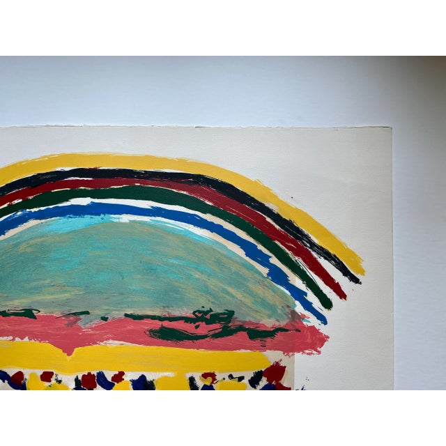 This original hand signed limited edition Menashe Kadishman serigraph of rainbow over a field is a wonderful example of...