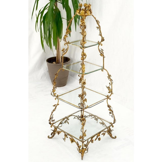Gilt metal flowers decorated Italian pyramid shape display shelves etagere table. 4 Tier etagere decorative accent shelf...