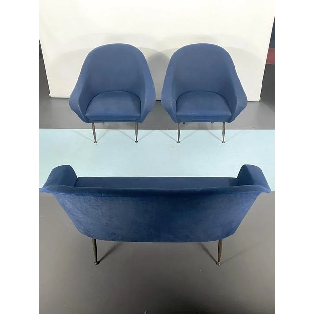 Original vintage condition with some defects on the fabric for this set of a sofa and two armchairs designed by Gastone...