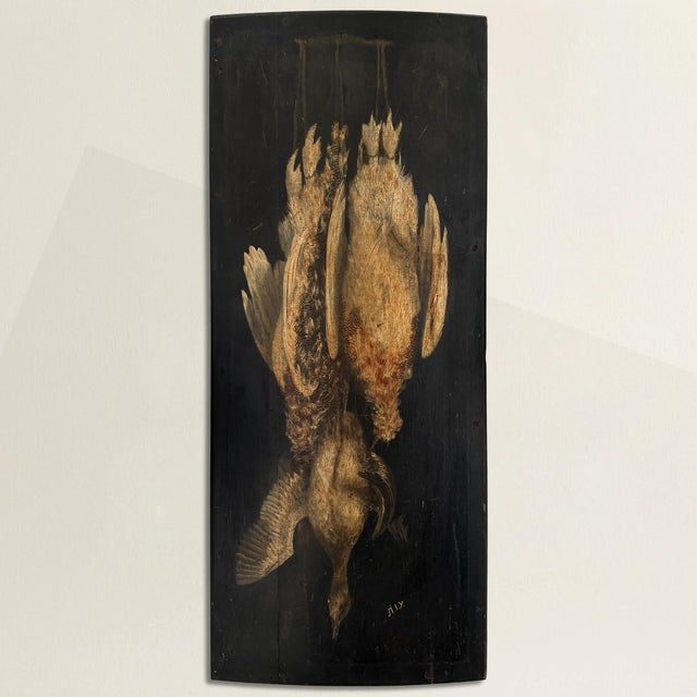 We bought it in England because it had presence. Two grouse. One duck. No fussy landscape, no theatrics—just the spoils of...