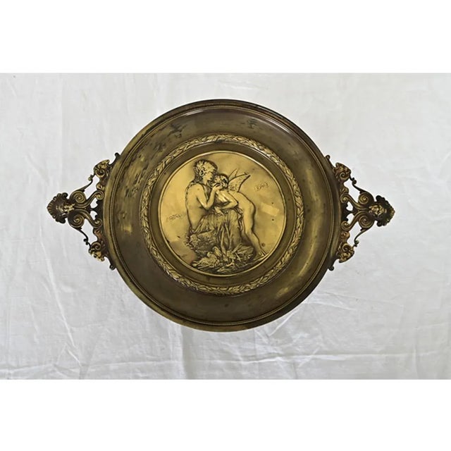 Late 19th century French tazza dish cast in heavy bronze with exquisite level of detail in every curve. At the center of...