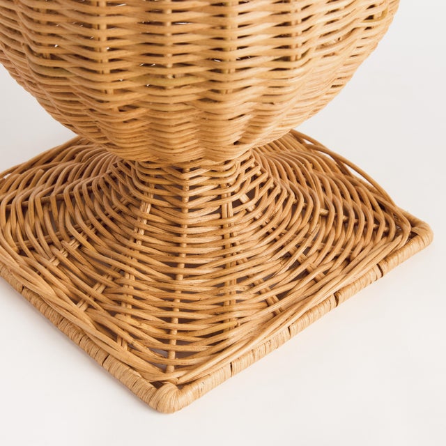 Woven in the form of a classical ceramic urn, this statuesque natural vessel is made of Lesles rattan. An upscale, durable...