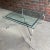 Square Chrome and Brass Hoof Feet Base Coffee Table Thick Glass Top. Table is not marked in any way. Brass feet polished...