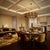 An elegant Murano chandelier with a distinctive circular structure, featuring a unique, linear yet refined design. The...