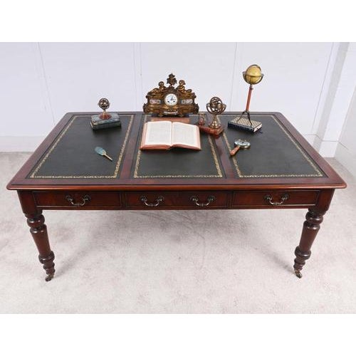 Fine Victorian mahogany library table - or desk dating to circa 1880 Featuring a large rectangular top inset with three...