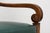 An elegant early 19th-century French Empire style walnut sofa, sourced in Lyon, France. Featuring a beautifully...