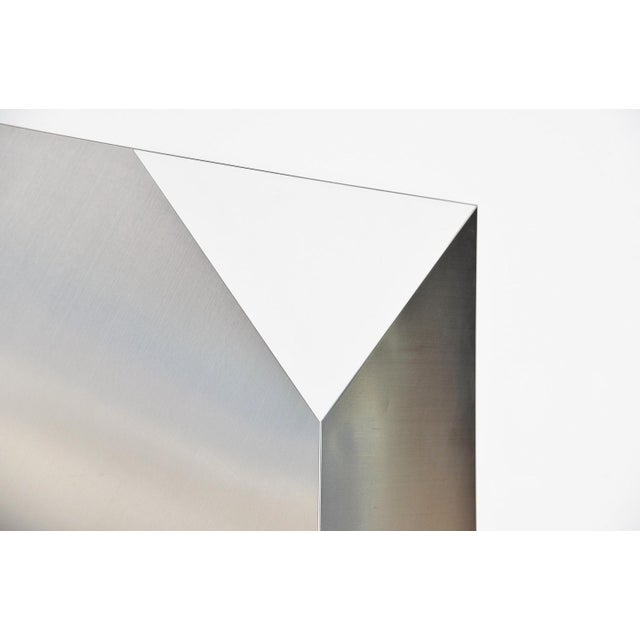 Large abstract modern shaped stainless steel wall artwork designed by Rudolf Wolf and manufactured in his own atelier in...