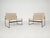 Very rare pair of black metal lounge chairs with rattan seatings, designed by the Spanish Gregorio Vicente Cortes and Luis...