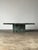 This vintage coffee table is pure drama — cut from Verde Alpi, a marble quarried in Italy's Aosta Valley— prized for its...