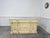 This molded counter, topped with an elegant gray marble slab, dates from the 1900s. Slender pilasters and geometric shapes...