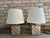 Pair of vintage travertine table lamps by Fratelli Mannelli with brass detail. These lamps have been newly rewired with a...