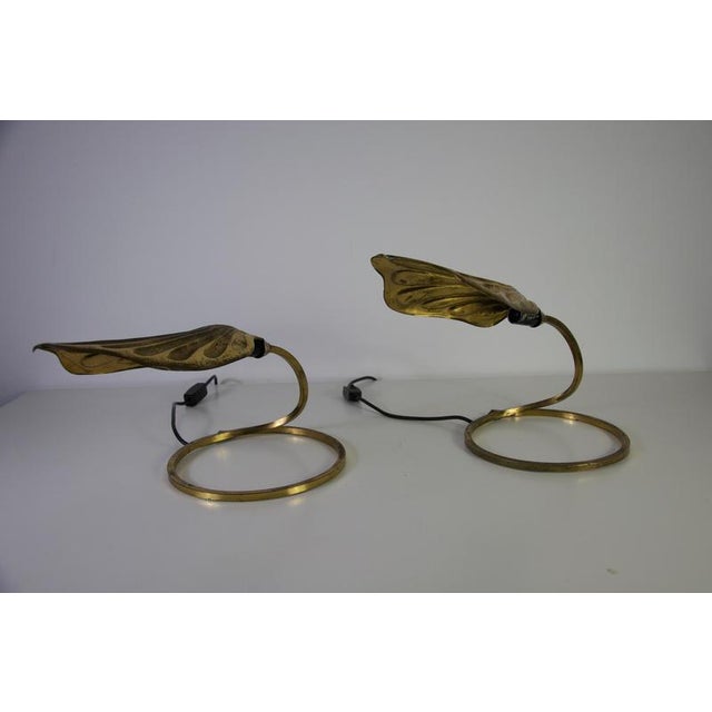 An elegant pair of mid-century table lamps attributed to tommaso barbi, produced in italy in the 1960s. Crafted in brass,...