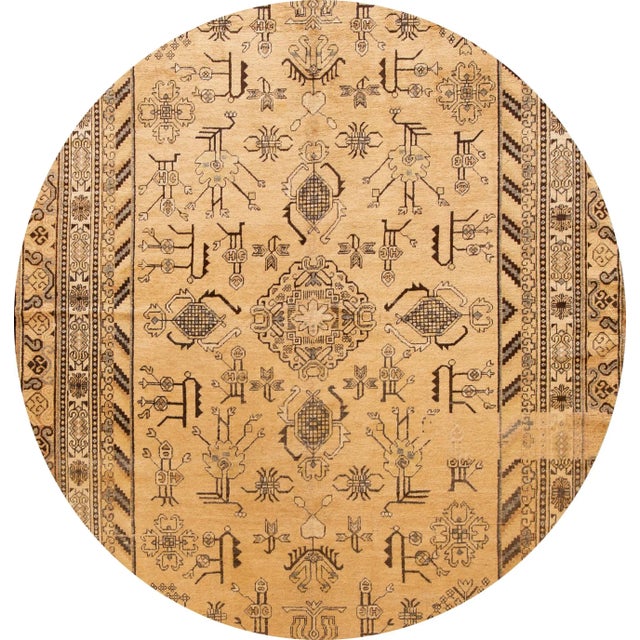 A beautiful antique Khotan rug with a peach field, and multi-color accents in an all-over medallion geometric design. This...