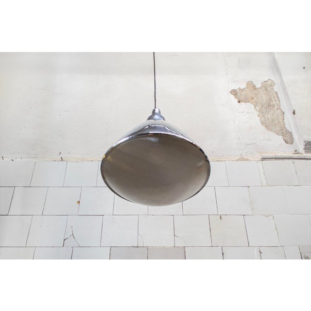 Lamp with chromed metal frame and plastic shade. Headlight model Designer Ingo Maurer Manufacturer Design M 1960s I have...