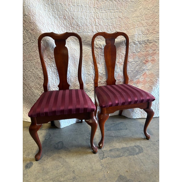 Queen Anne-style dining chairs by Cresent Furniture manufactured in the 1990's are well crafted in a classic design....