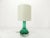 Brutalist lamp in thick emerald green translucent glass, designed by Hans-Owing Sandeberg for Kosta. It is signed under...