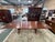 A monumental Stickley Mission Collection trestle dining table crafted in the spirit of classic American Arts & Crafts...