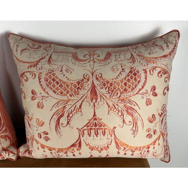 Discover a beautifully composed pair of decorative pillows crafted from vintage Fortuny “Mezziano” fabric, masterfully re-...