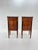 An elegant pair of early 19th-century Italian Empire commodini distinguished by their unusually tall, slender proportions...