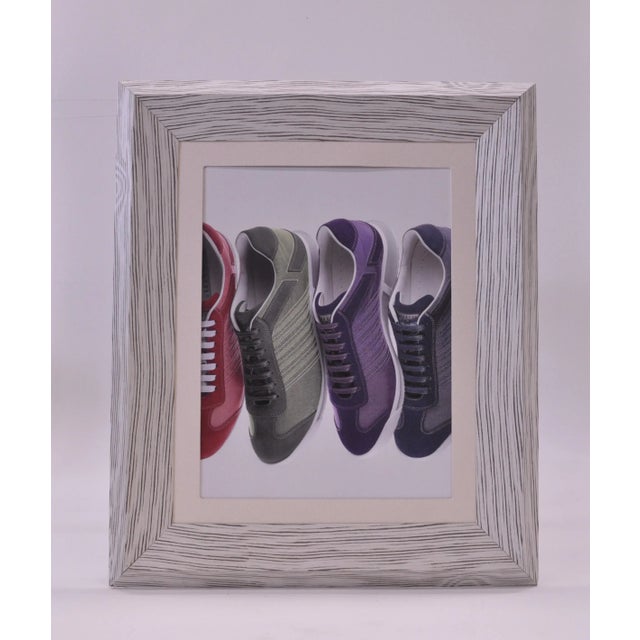 Giant frames with chipboard structure covered in composite zebra wood. The back side is covered in laminate of the same...