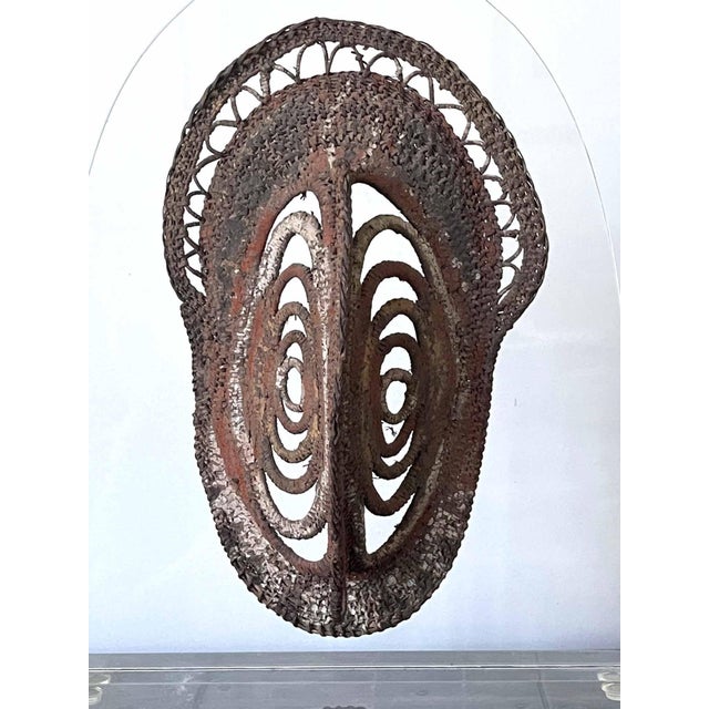 A well preserved Yam Ancestor mask professionally presented on a museum quality acrylic display stand. The mask was a...