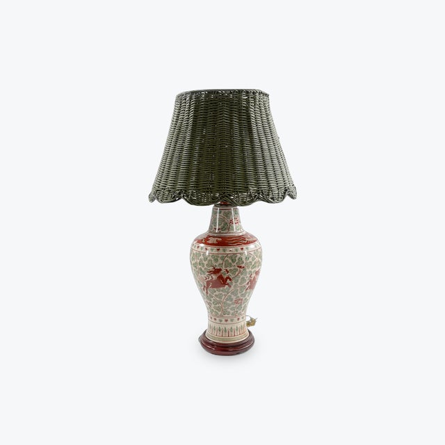 Pair of Chinese Porcelain Baluster Urns Mounted as Lamps, with crackle glaze and hand-painted qilin and foliate design...