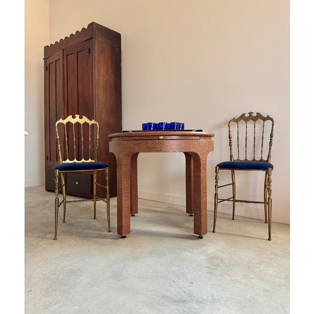 Harrison Van Horn lacquered raffia game table with slide out shelf. An uncommon piece in very very nice original...