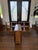 An exceptionally clever and beautifully engineered Mid-Century Modern space-saving dining set, crafted in Romania during...