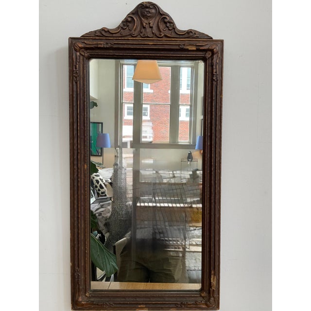 Timeless elegance featuring an intricate gesso and carved wood frame with a beautifully detailed crest, this piece...