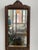 Timeless elegance featuring an intricate gesso and carved wood frame with a beautifully detailed crest, this piece...