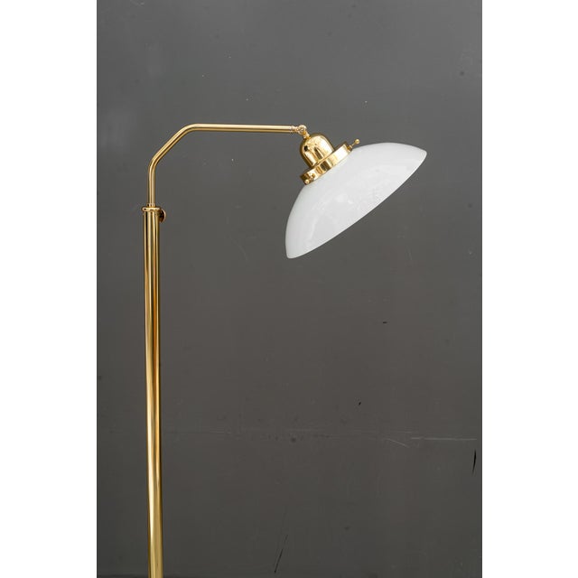 Height adjustable from 138cm - 163cm Brass polished and stove enameled Original opal glass shade European Plug (up to...